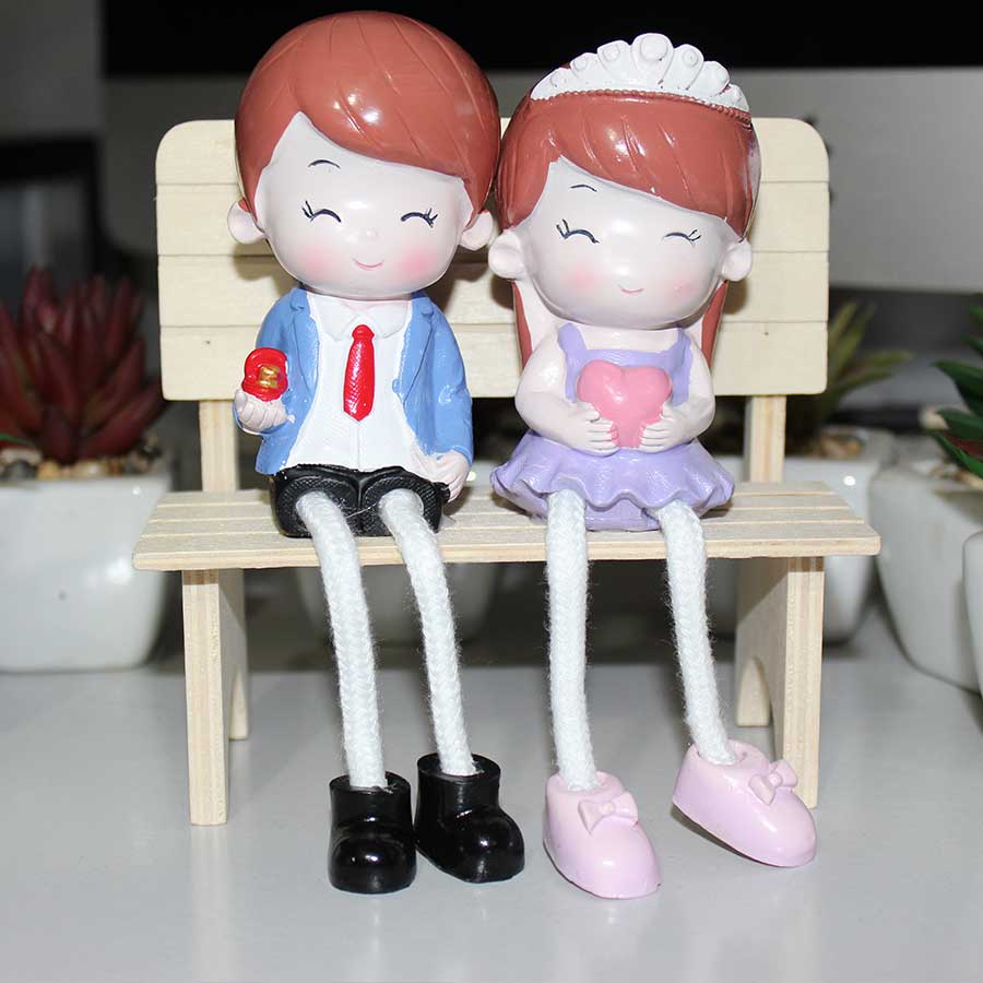 Beautiful Hanging Leg Couple Showpieces (With Chair)