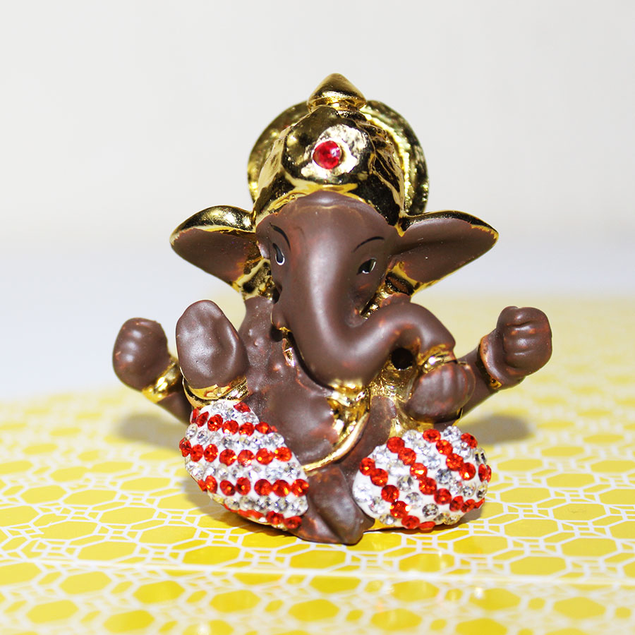 Lord  Ganesha in brown and 24kt Gold Foil with stone decorated
