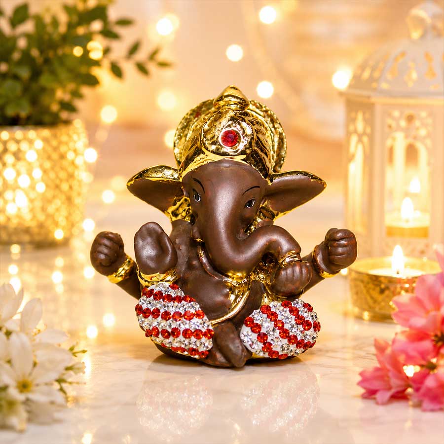 Lord  Ganesha in brown and 24kt Gold Foil with stone decorated