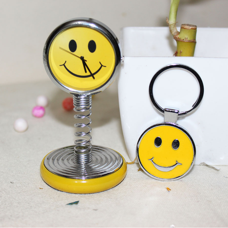 Yellow smiley spring clock with smiley  keychain ( for car)