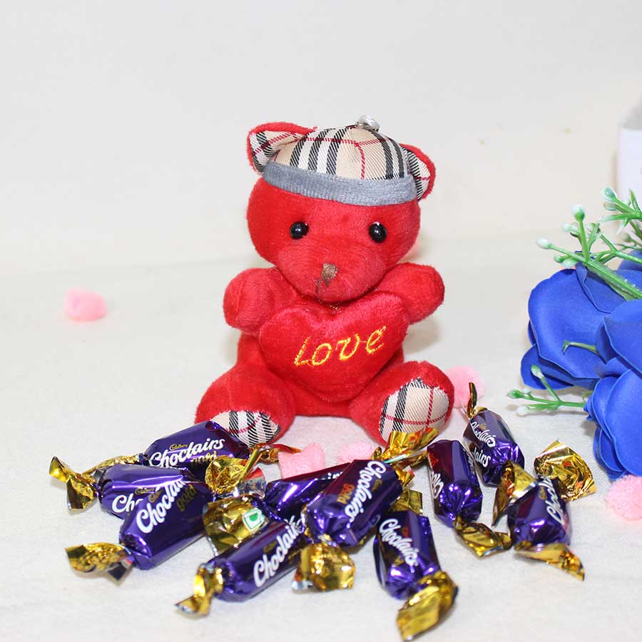 Red Teddy with chocolates